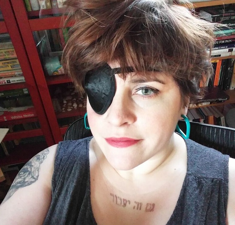 Cassandra wearing an eye patch Cassandra wearing an eye patch